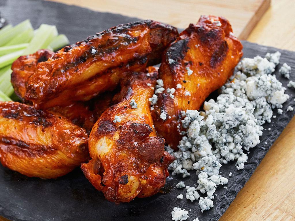 Hot Wings · Sweet Sriracha or Buffalo-style, celery and dipping sauce.