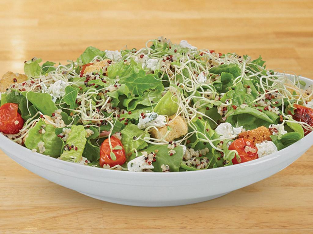 Hippie Salad · Organic mixed greens, lettuce blend, herbed goat cheese, alfalfa sprouts, roasted grape tomatoes, quinoa and garlic croutons tossed with Dijon balsamic.