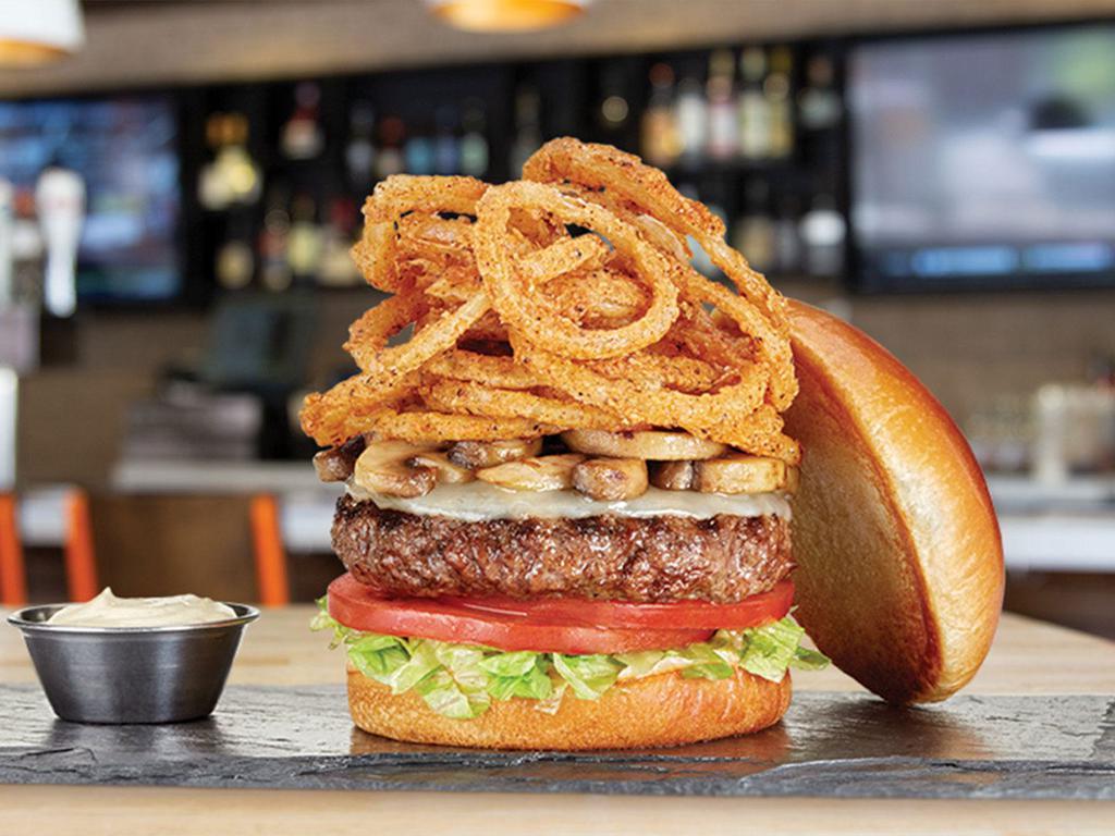 The Counter Burger · All natural beef, provolone, tomatoes, lettuce blend, fried onion string, sauteed mushrooms and garlic aioli on brioche bun.