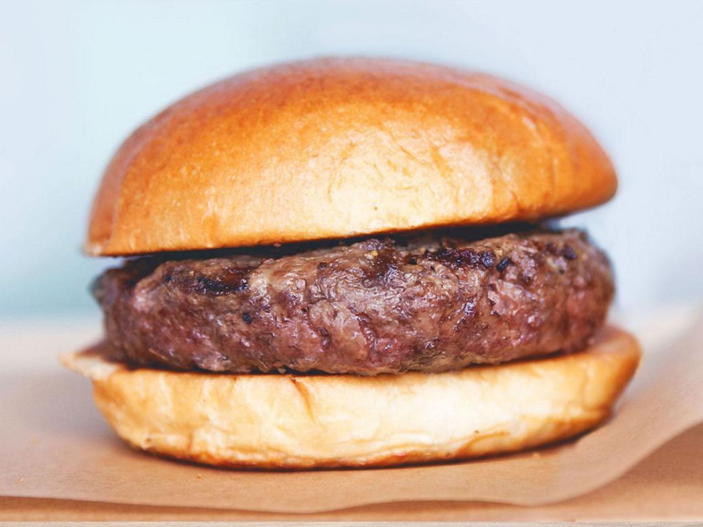 The Purist Burger · All natural beef and brioche bun. 