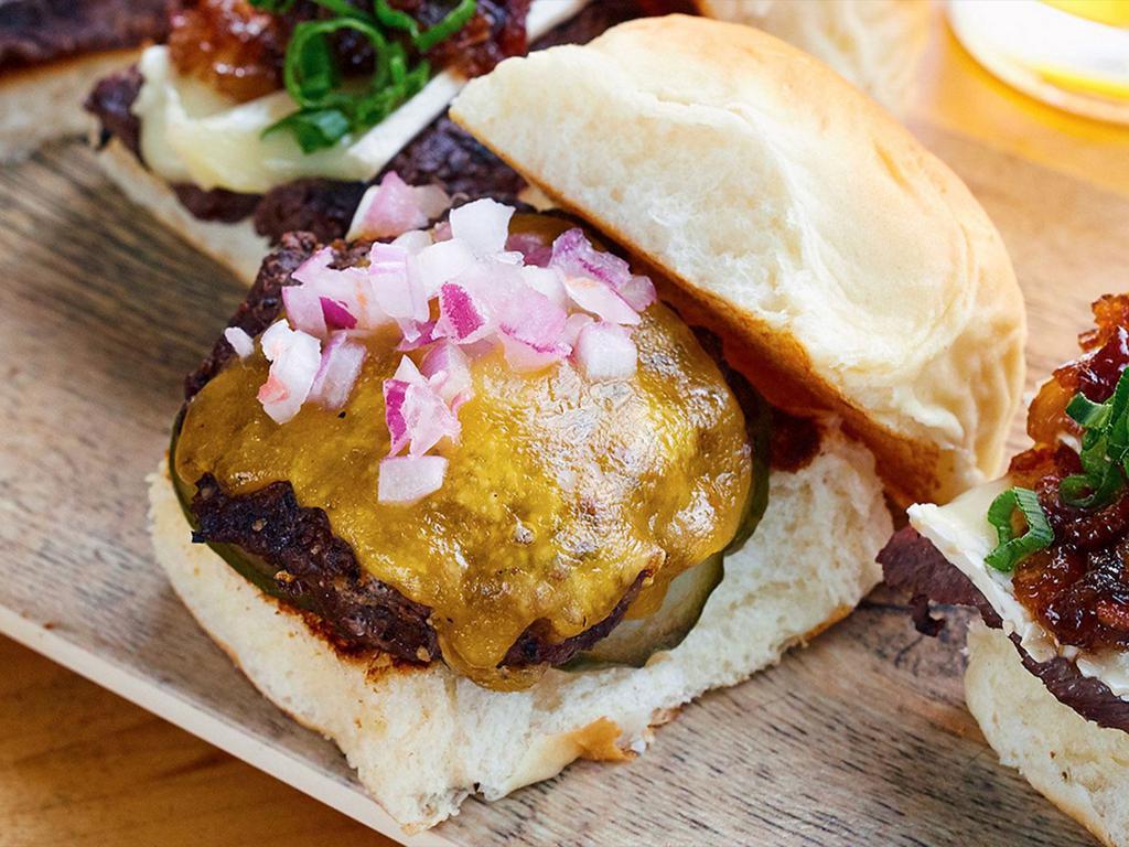 Mini Burgers · All natural beef, cheddar, pickles, red onions, the counter relish and mini Hawaiian buns. 