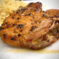 Single Center Cut Pork Chop · Pan seared and oven roasted. Served with two sides.