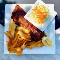 Half Rack Baby Back Ribs · BBQ pork ribs served with French Fries and Coleslaw