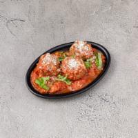 Meatballs · 3 meatballs, ricotta, pomadoro sauce and fresh basil.