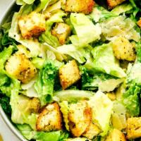 CAESAR SALAD · Green salad with Caesar dressing and cheese. 