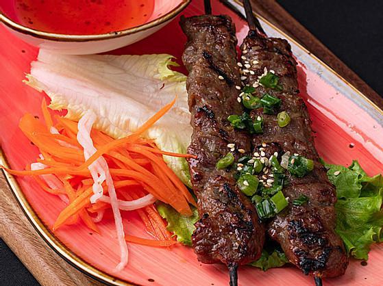 Grilled Beef Skewers · These beef skewers are marinated with a flavorful lemon grass marinade, garlic and sesame oil. Served with sweet chili sauce.