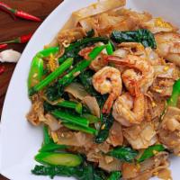 Pad See Ew · Fresh wide rice noodles stir-fried with Chinese broccoli, egg and blend with our traditional...