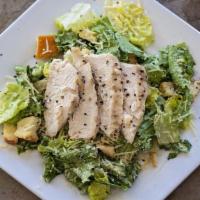 Chicken Caesar Salad · Chopped romaine tossed with Parmesan, herbed croutons, and Caesar dressing.