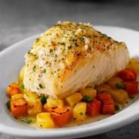 Chilean Sea Bass* · Pan roasted, citrus-coconut butter, sweet potato, and pineapple hash.