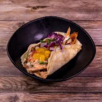 Baja Taco · Grilled fish combined with melted chihuahua cheese, served on a corn tortilla. Garnished wit...