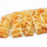 Triple 3-Cheese Garlicstix Topperstix · Our delicious Original Topperstix topped with roasted garlic, asiago and cheddar cheese. Mad...