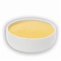 Garlic Sauce · A garlic and salty butter sauce that is great for dipping crust or Topperstix.