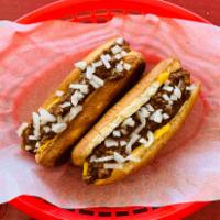Chili-Cheese Dogs · Two Chili-Cheese Dogs;
Dressed with Beef Chili, Nacho Cheese and Chopped Onions.