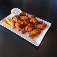 J. Brian's Famous Wings · Comes with bleu cheese dressing and fresh veggies.