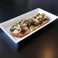 Mexican Flatbread Pizza · Beef, tomatoes, onions, jalapenos, and black olives.