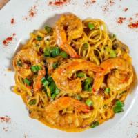 Jambalaya · (Try Vegan) Gulf Shrimp, Chicken, Smoked Sausage, Onions, Peppers and Mushrooms in a Tomato ...