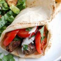 Grilled Beef Kabob Wrap · Marinated beef served with choice of lettuce, tomatoes, onions, pickles, hummus, tahini, tza...