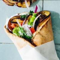 Mediterranean Veggie Wrap · Falafel and fresh eggplant served with choice of lettuce, tomatoes, onions, pickles, hummus,...