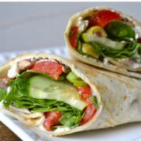 Greek Veggie Wrap · Lettuce, tomato, feta, onions, pickles, hummus, tzatziki, Greek dressing, olives, cucumbers,...