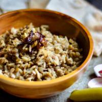 Jedra · Rice pilaf Mediterranean style with lentils, onion and spices.
Served with pita bread on the...