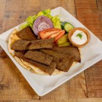 Gyros Plate · Mixture of spiced lamb and beef. Served with fresh vegetables, pita bread, and tzatziki sauce