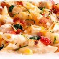 Chicken Bacon Alfredo Pasta · Penne pasta, creamy Alfredo sauce, roasted chicken, tomatoes, spinach and bacon.