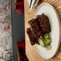Black Bean Ribs · 1/2 rack baby back ribs with black bean sauce, honey, five spices, white pepper served with ...
