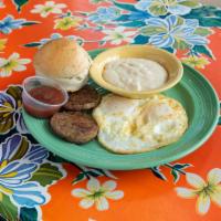 Flying Biscuit Breakfast · Two eggs served with choice of sausage patties, choice of side and a fluffy flying biscuit w...
