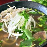 Pho Beef Combo · Special combo pho. Rare sliced beef, brisket, and flank with mixed veggies. Best pho in Cent...