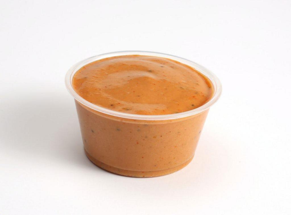 Slim Sauce · TRUE ORIGINAL
Slim Sauce is an institution—a super secret sauce with herb tomato flavors and a hint of pepper. A Slim Chickens classic with a smooth kick.
SPICE LEVEL: MILD