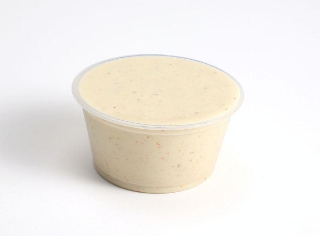 Cayenne Ranch · CREAMY WITH A KICK
Cayenne Ranch perfectly blends cool, creamy ranch with a kick of cayenne. A zing and a spicy zang for those who like their ranch a little more extreme.
SPICE LEVEL: MEDIUM
