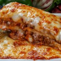 Meat Lasagna · Our traditional lasagna with Italian sausage, sliced pepperoni, ground beef & marinara.  ser...