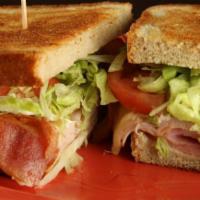 House Club · Ham, turkey breast, swiss cheese, bacon, lettuce, tomato & mayonnaise. Grilled on deli style...
