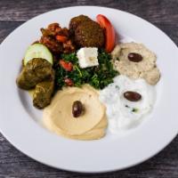Mediterranean Antipasto Platter · hummus duo, baba ganoosh, tzatziki, taboule, dolma, mozzarella-tomato & basil, falafel, feta...
