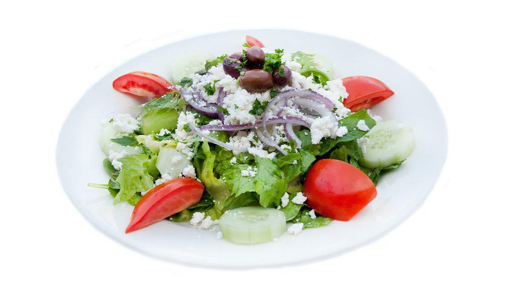 Small Greek Salad · seasonal mixed greens, tomatoes, cucumbers, red onions, feta, kalamata olives and lemon vinaigrette