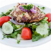 Grilled Chicken Salad · grilled marinated all-natural chicken breast, seasonal mixed greens, tomatoes, cucumbers, re...