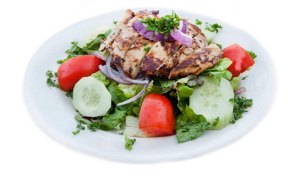 Grilled Chicken Salad · grilled marinated all-natural chicken breast, seasonal mixed greens, tomatoes, cucumbers, red onions and lemon vinaigrette