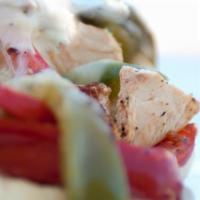 Philly Chicken Pita · grilled-marinated all-natural chicken breast, roasted bell peppers and onions, Swiss, Greek ...