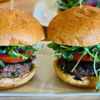 Kafta Beef* Burger · hand-formed beef, pomegranate molasses patty, mixed with minced parsley, jalapenos, onions, ...