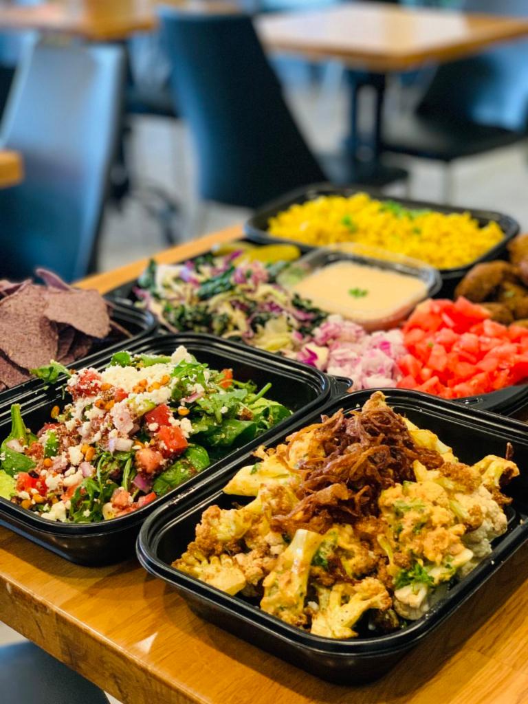Family Meal · Serves 4. Choose a starter hummus and pita and build your own combo - choose base, green, sauce, protein and side. Choose a dessert. Add extras for an additional charge.
