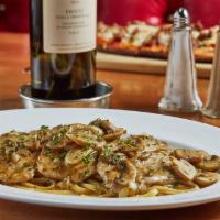 Chicken Marsala · Mushrooms, Sweet Marsala Wine, Served with Pasta