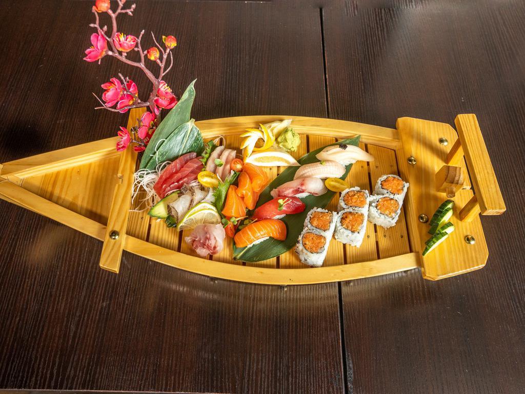 Sushi and Sashimi Combo Dinner · Chef selection 5 pieces sushi, 12 pieces sashimi and spicy tuna roll.