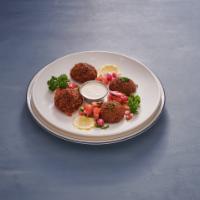 Falafel Plate · Four fried vegetable patties made from chickpeas, fava beans, garlic, cilantro, onions and M...