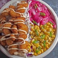 Popcorn Shrimp Lover  · Fried popcorn shrimp, cabbage, corn, pickled red onion, green onion, tangy dressing. 