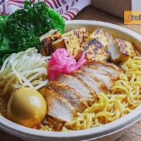 Laksa Curry Ramen · Curry broth, chicken, tofu, pickled red onion, spinach, bean sprouts. 
