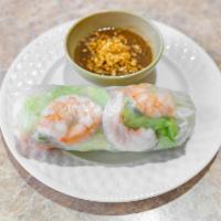 2 shrimp spring. Roll · Served with lettuce, cilantro, basil, vermicelli noodles, peanut sauce on the side.