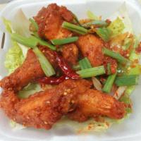 5 Chicken Spicy Wings · 5 seasoned drumps & winglets dipped in tapioca starch and fried crispy wok, tossed with whit...