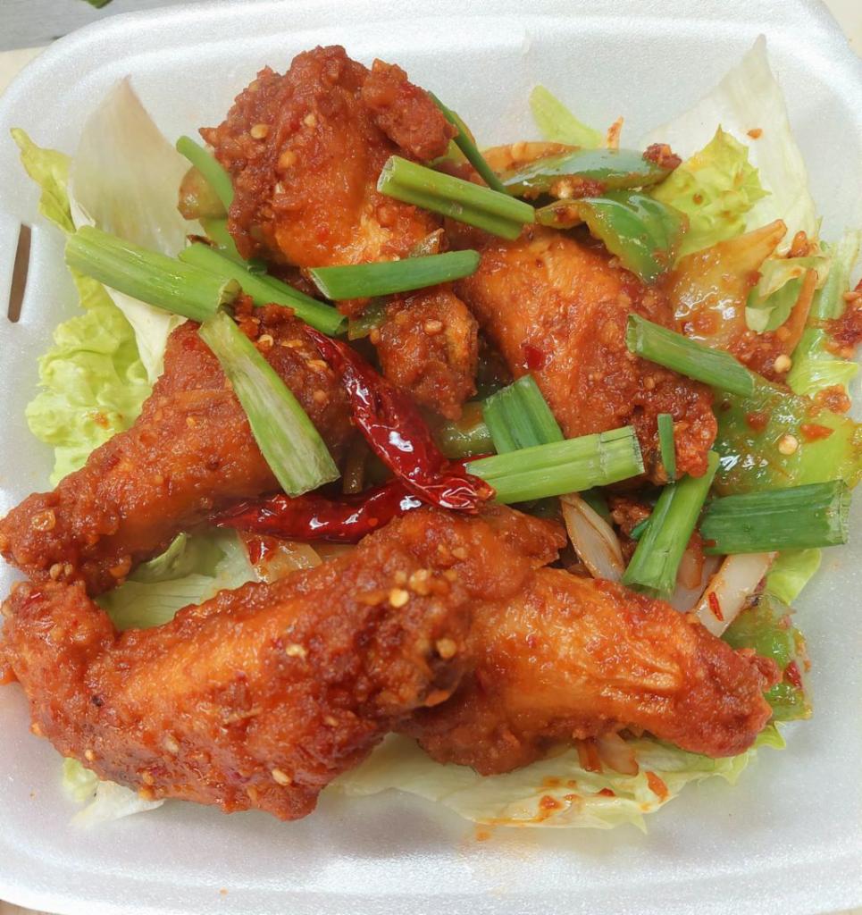 5 Chicken Spicy Wings · 5 seasoned drumps & winglets dipped in tapioca starch and fried crispy wok, tossed with white onion, green onion, red chili pepper and house spicy sauce.