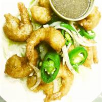 10 Dynamite Shrimp · Shrimp dipped in tempura batter fried crispy wok, tossed with garlic jalapenos, spring onion...