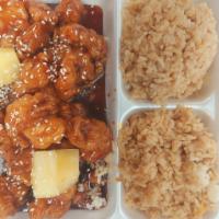 Sesame Chicken · Deep fried util crispy sauteed in brown sauce with pineapple sesame seeds.and sweet brown sa...